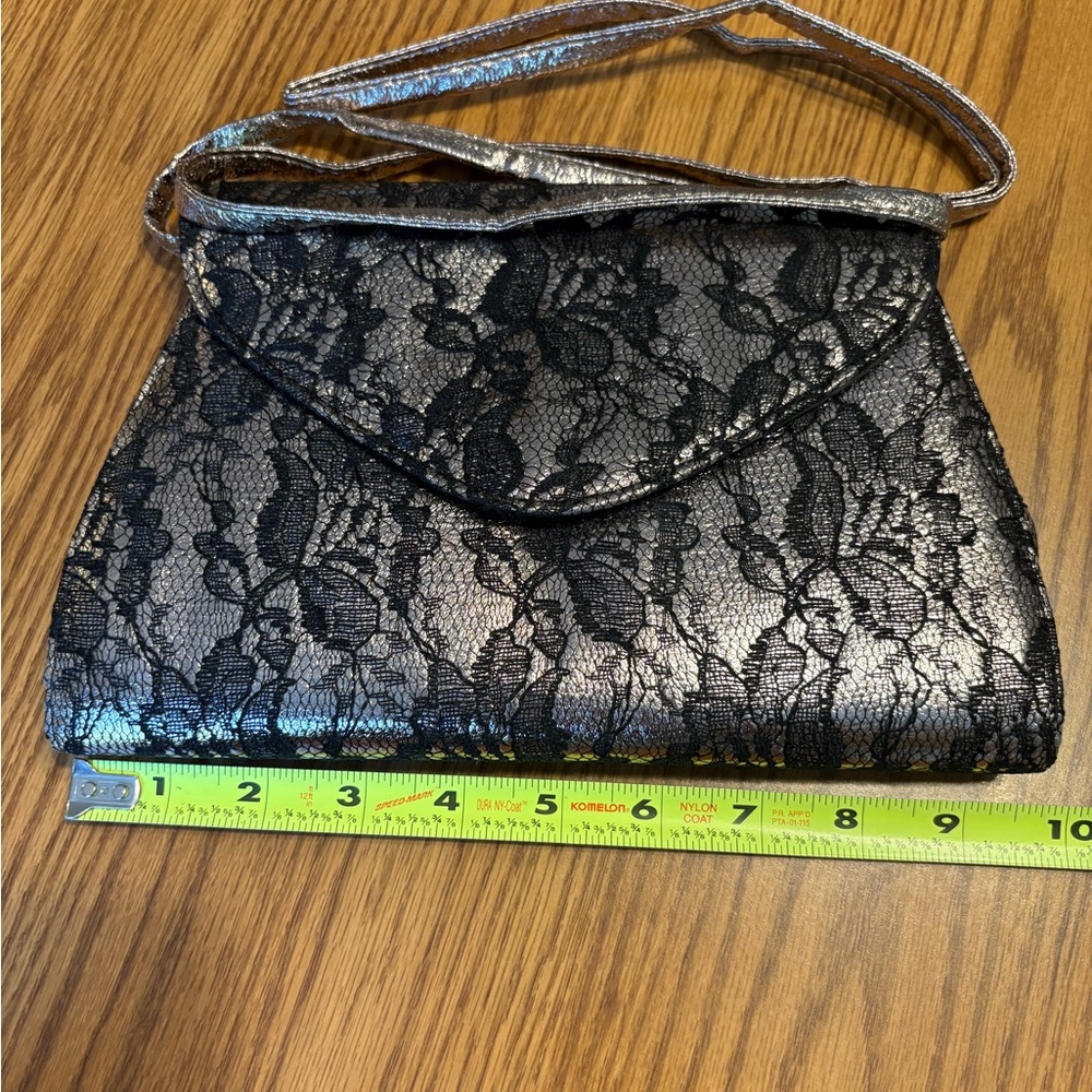 Elegant Black Lace

Neiman Marcus Vintage Black Lace Clutch/Shoulder Bag
